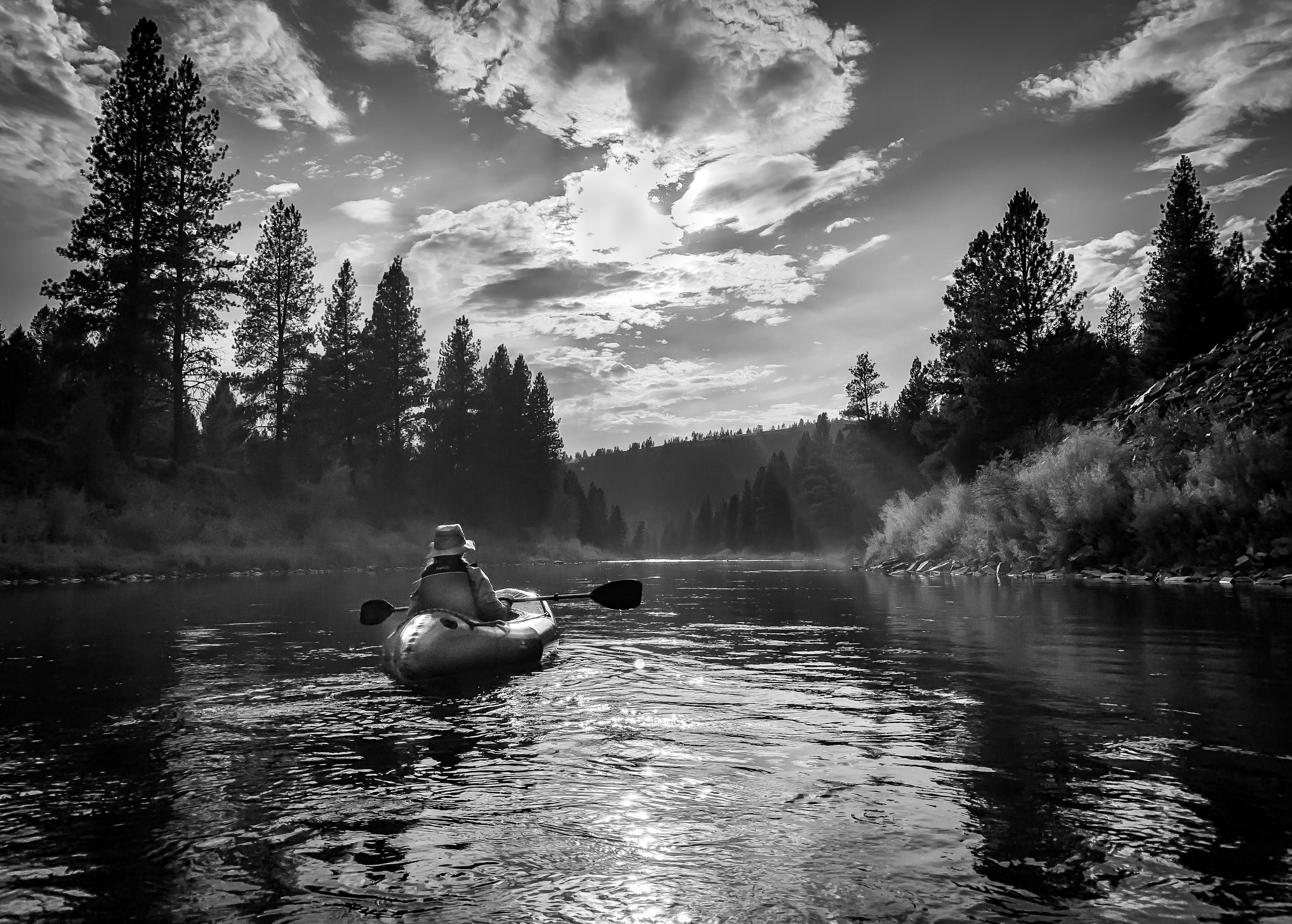 A paddler traveling down the Blackfoot River